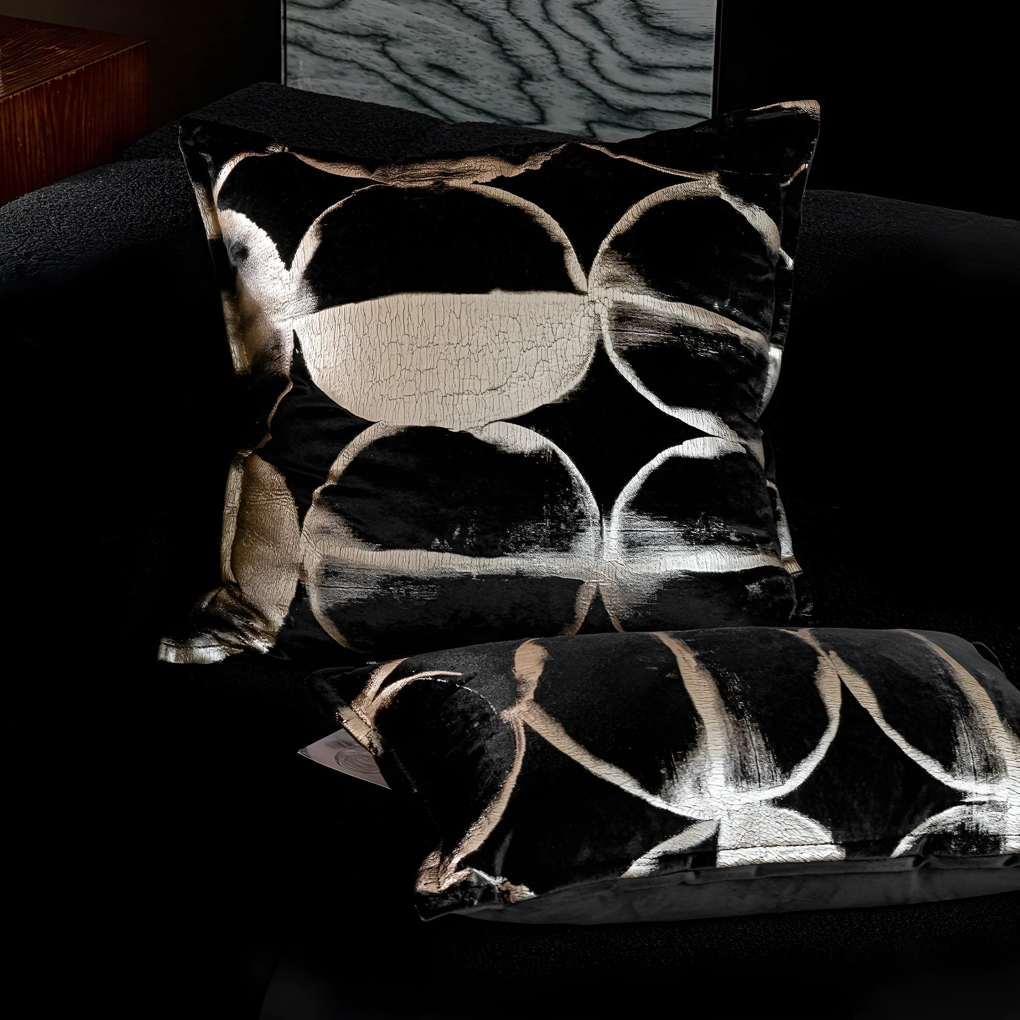 Abstract black and gold pattern decorative flannel cushion cover with zip, shown in three size options.