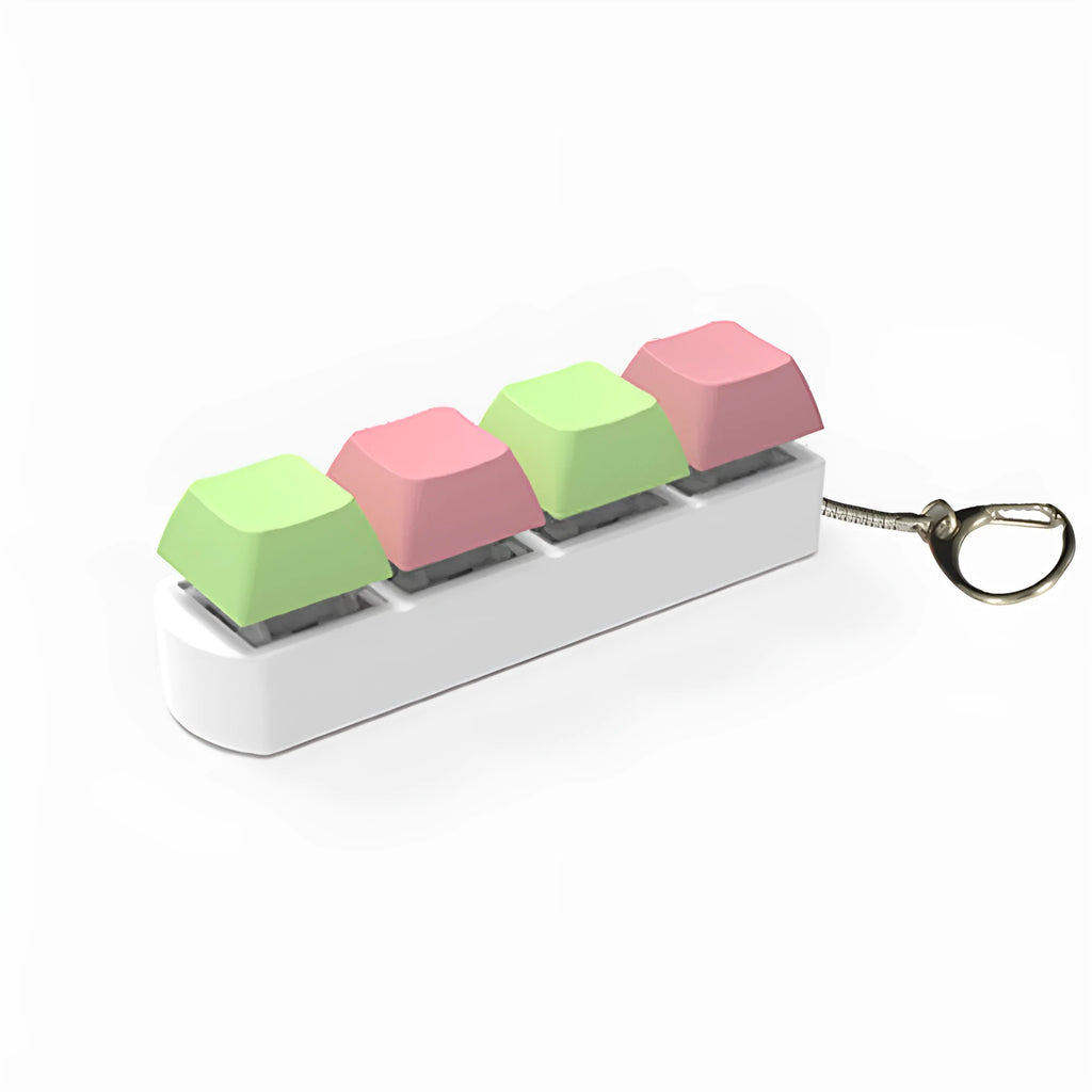 Four-key mechanical keyboard switch shaft tester with coloured keycaps and transparent base on a desk.