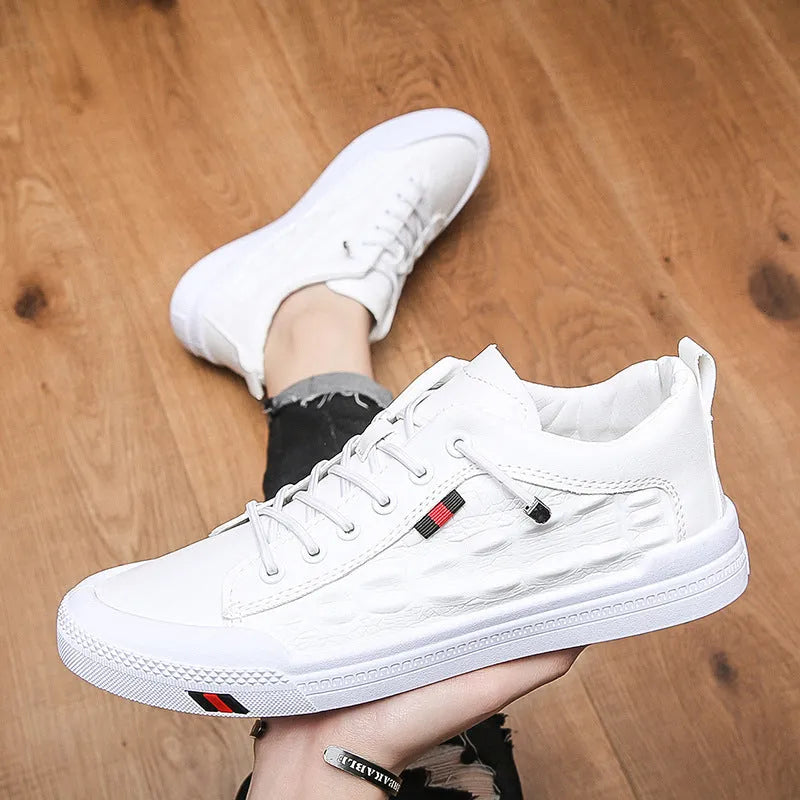 Men's white lace-up casual sneakers with PU leather upper and round toe on a rubber sole.