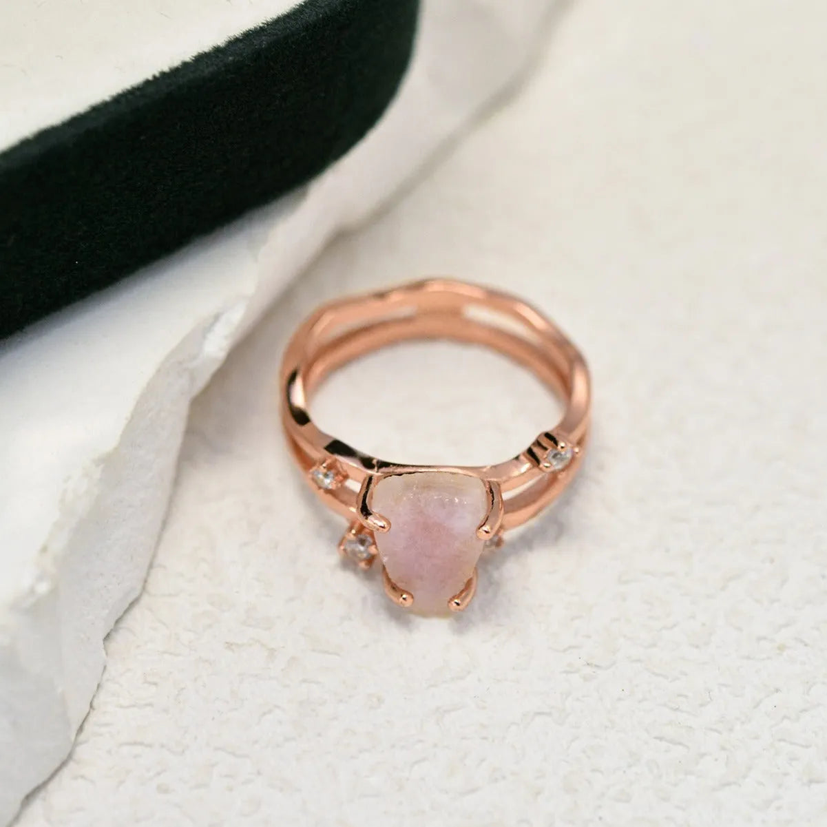 S925 silver geometric ring featuring an irregular triangle design with a moonstone, shown in rose gold, white gold, and yellow gold finishes.