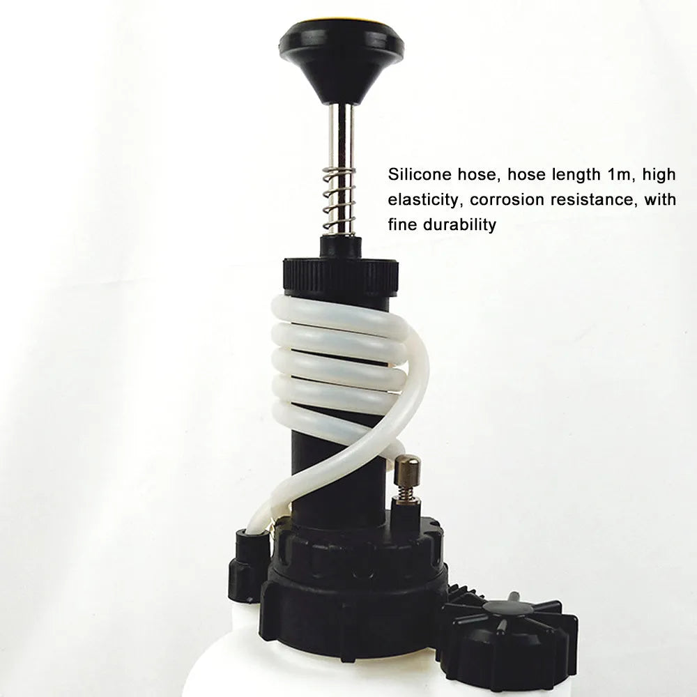 White 3L brake oil tank replacement tool with copper and iron fittings on a compact box.