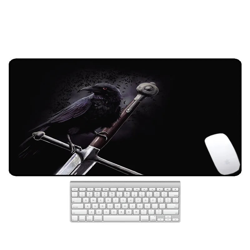 Large patterned desk mat for mouse and keyboard on a wooden desk.