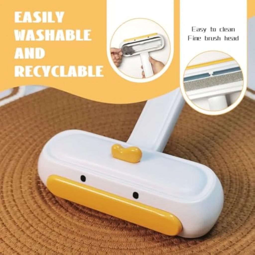 White portable pet hair remover tool with cartoon yellow duck design and polyester bristle surface