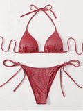 Women's black split bandage bikini swimsuit on a mannequin, showing the briefs style.