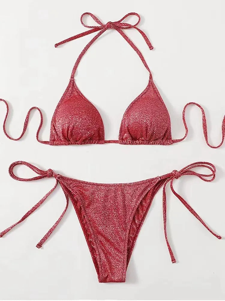 Women's black split bandage bikini swimsuit on a mannequin, showing the briefs style.
