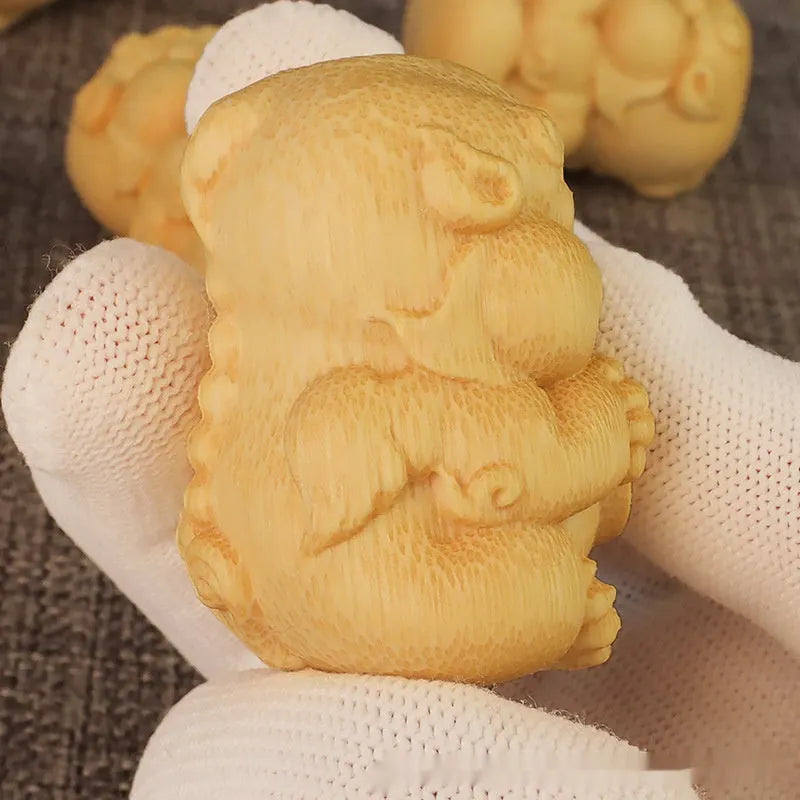 Carved bamboo ornament with take money design, 4.5cm tall with 3.5cm diameter base