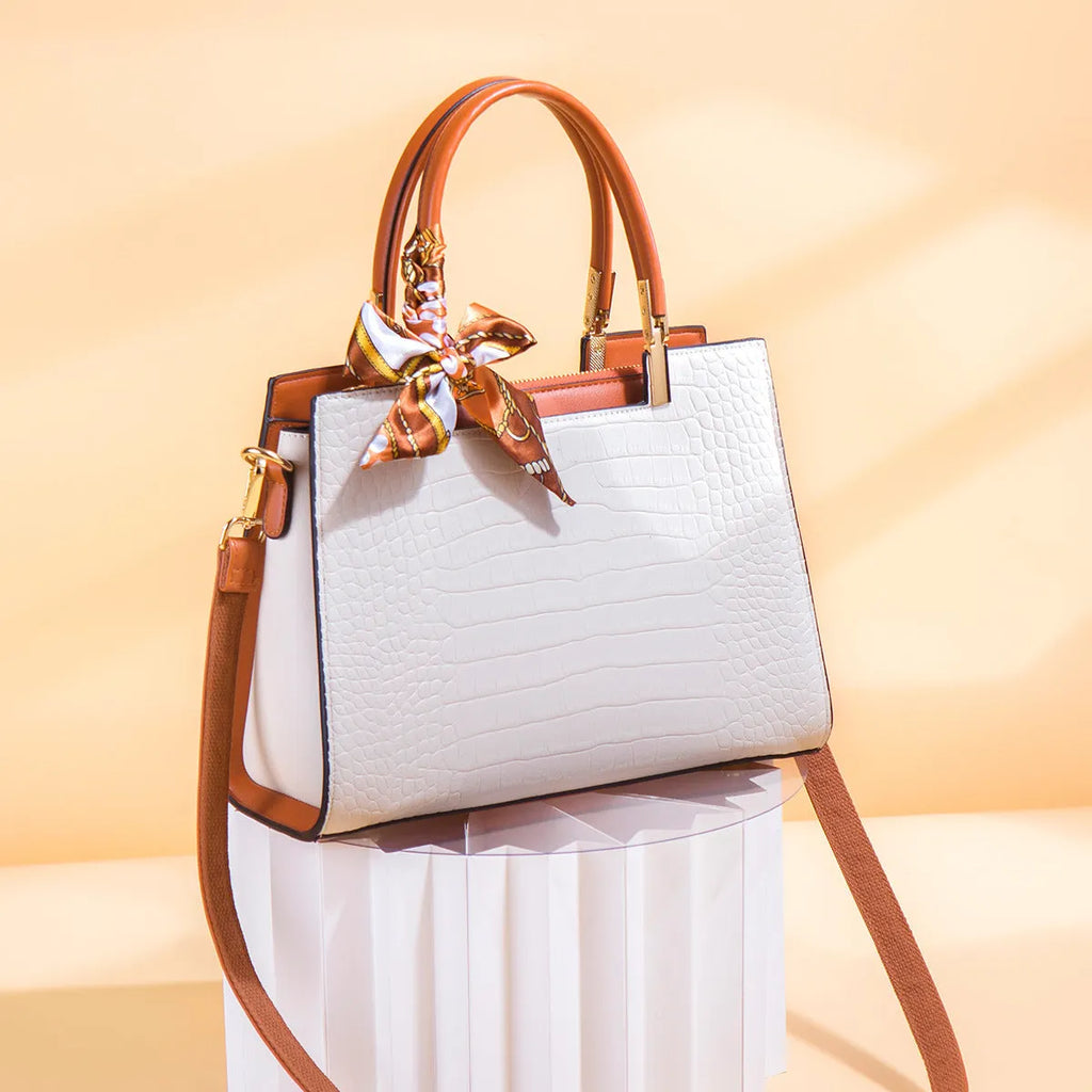 Milky white women's PU leather handbag with horizontal square shape and multiple interior compartments