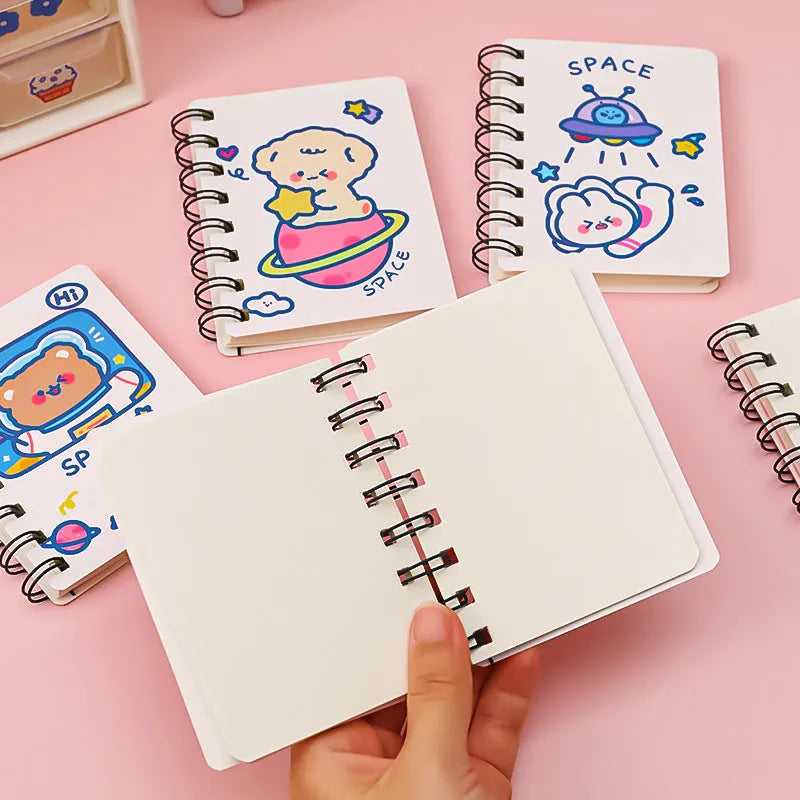 Astronaut series flippable pocket notebook showing cover design options and 10.5cm by 8cm size.