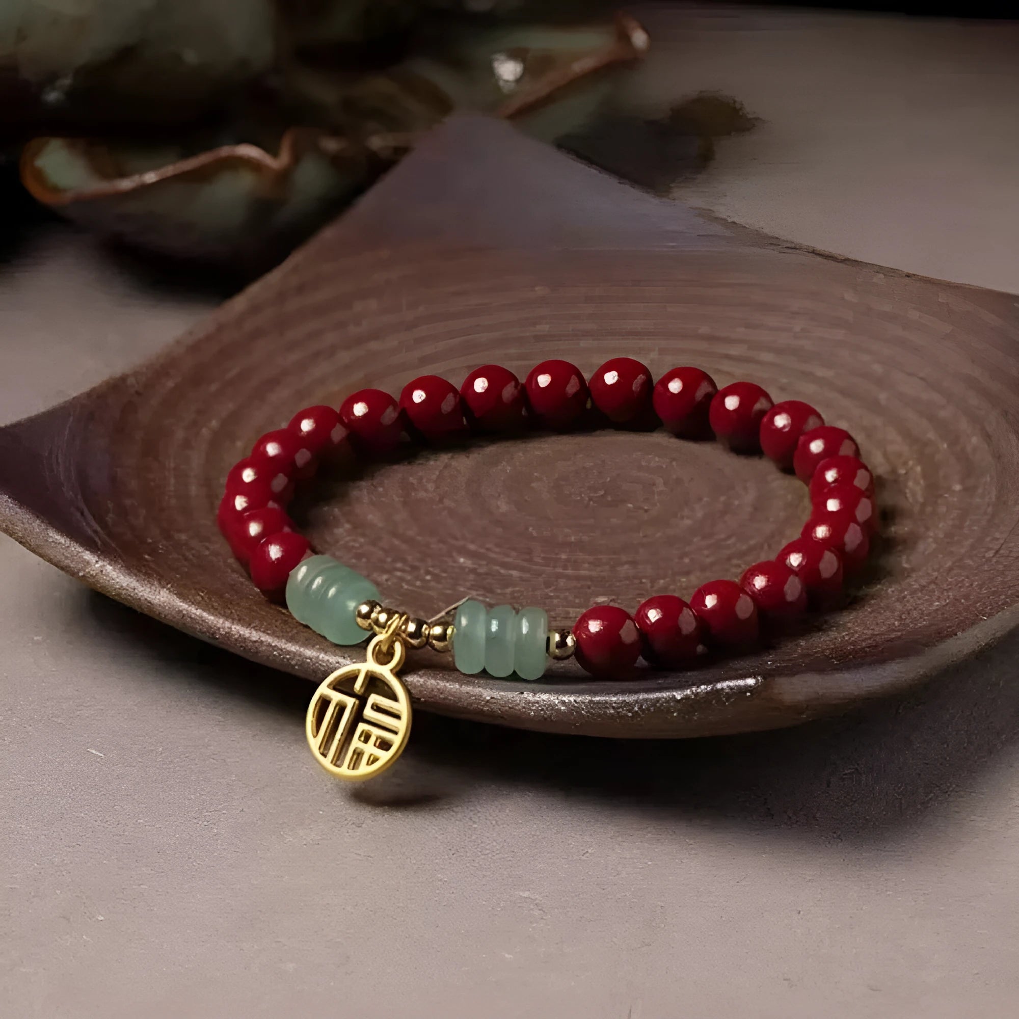 Handcrafted gold cinnabar bracelet with wave design in pumpkin cinnabar colour