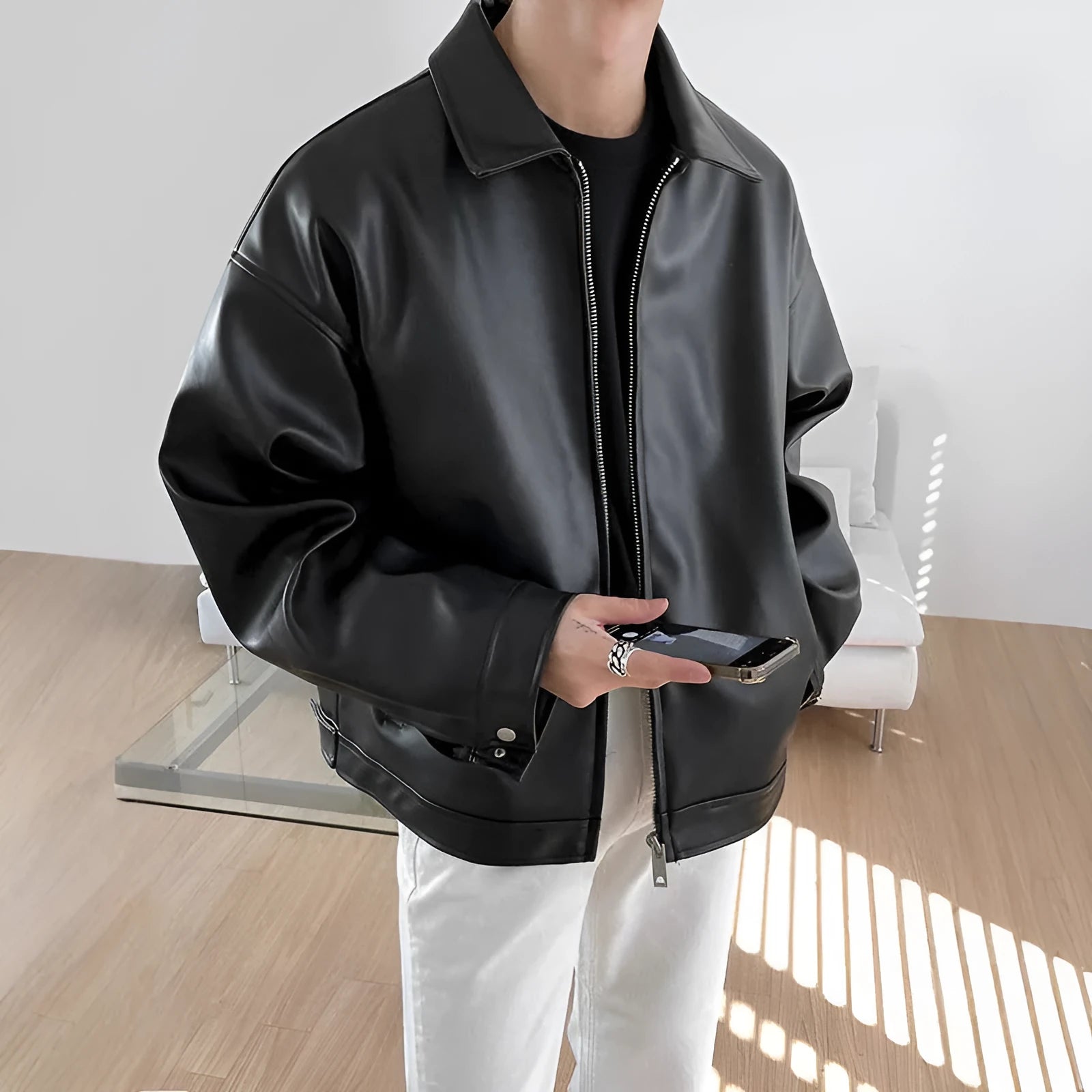 Men's black leather-style casual baseball jacket with loose fit and side seam pockets