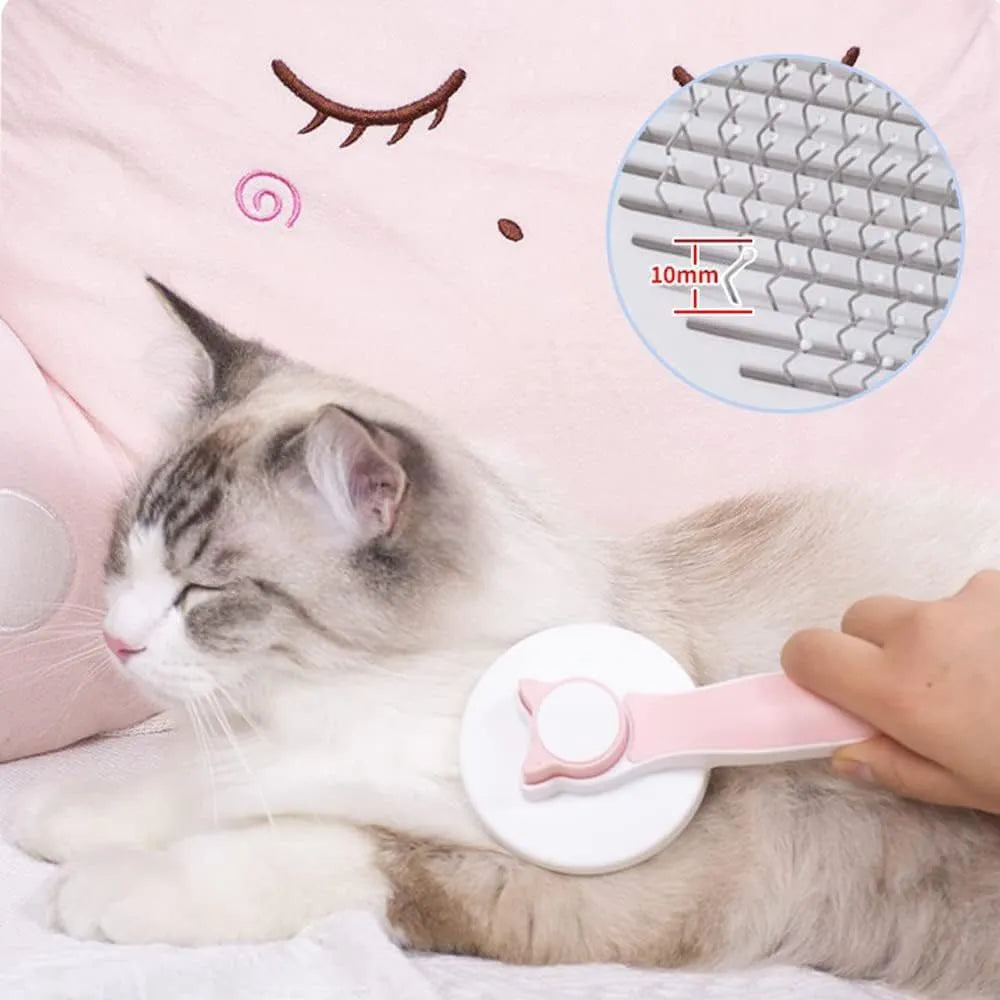 Blue self-cleaning cat and dog grooming brush with rubber-tipped pins and a non-slip rubber handle.