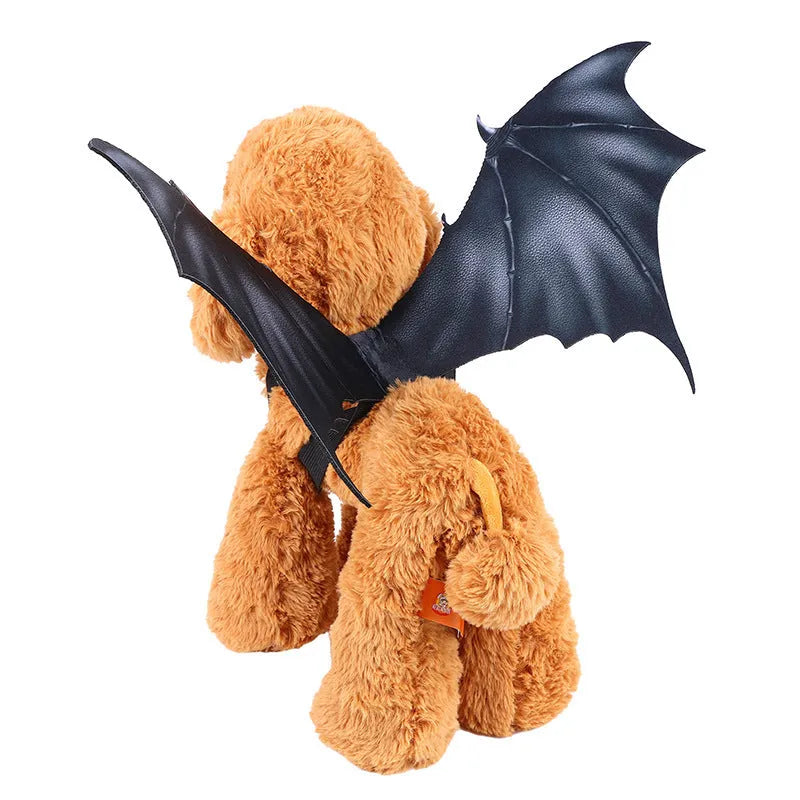 Black cloth bat wing Halloween costume for a dog or cat showing three size options.