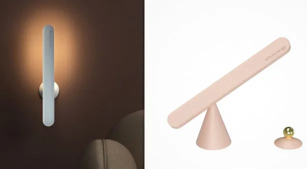 White geometric desk lamp with a magnetic base and touch control, placed on a wooden desk.