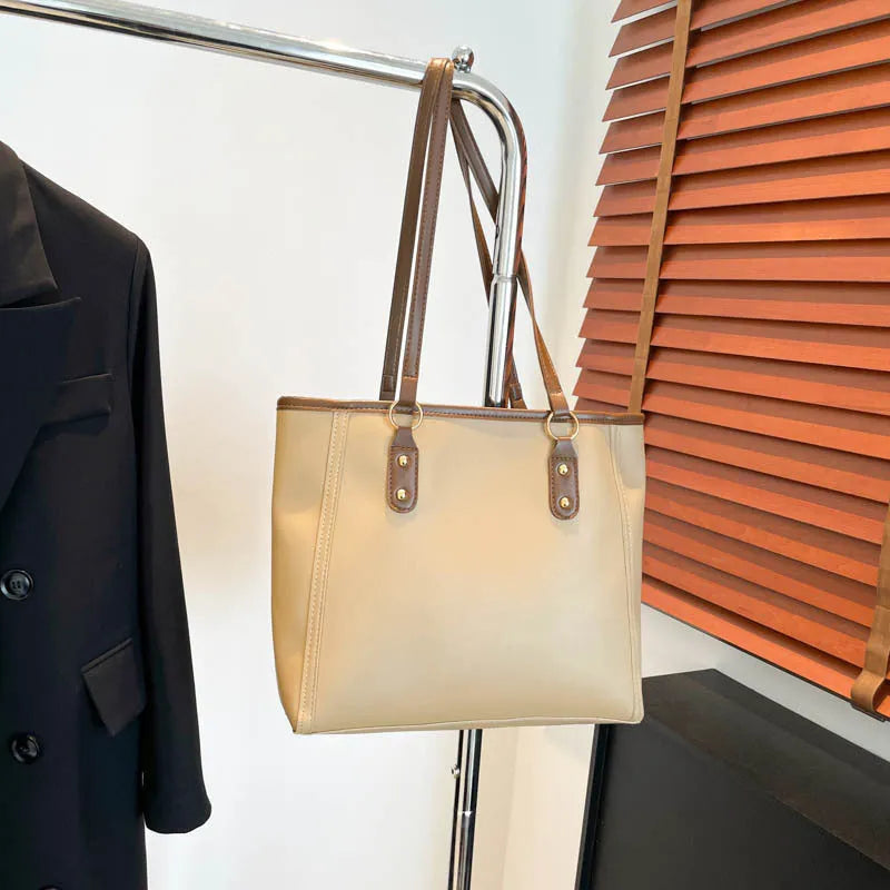Korean style black PU shoulder underarm bag with a sandwich pocket and horizontal square shape.