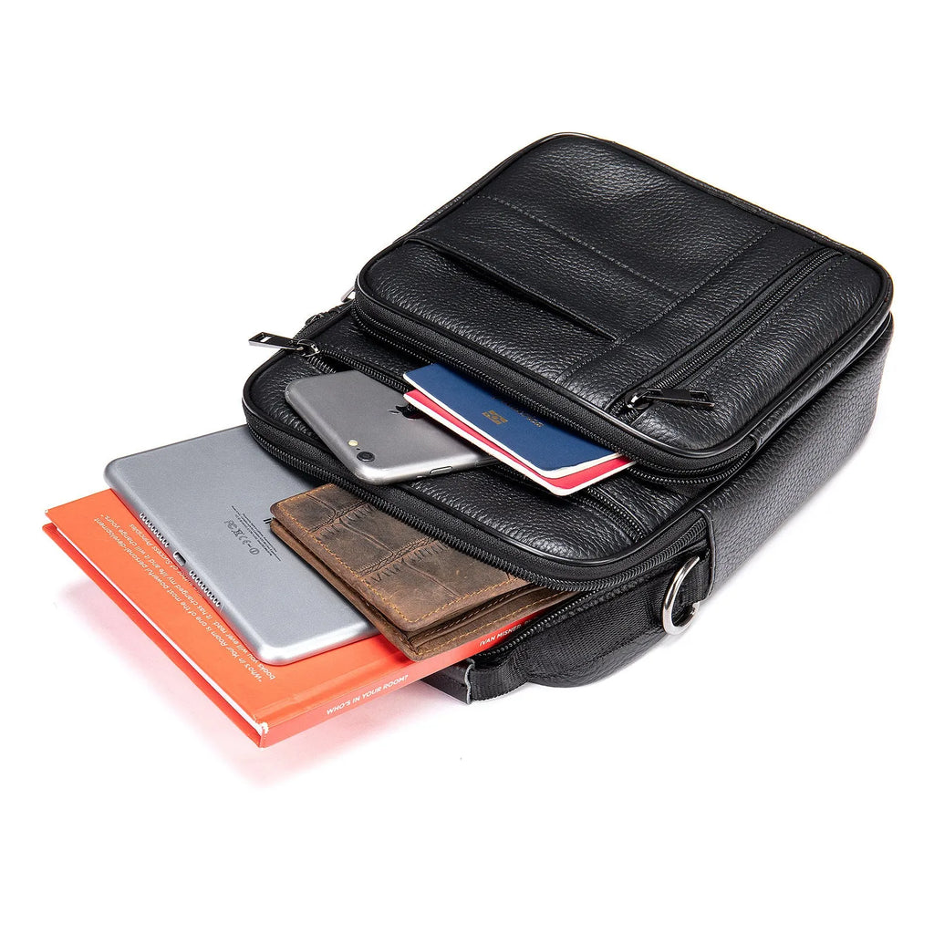 Men's black genuine leather retro shoulder bag shown from the front, showcasing its vertical square shape and zip closure.