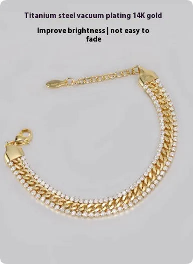 Gold-coloured titanium steel tennis bracelet with stone inlay for men and women.
