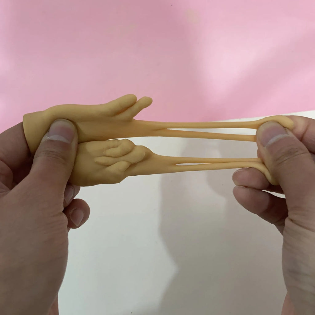 Stretchable mini trim cat teaser toy with TPR finger cot design and multiple colour options