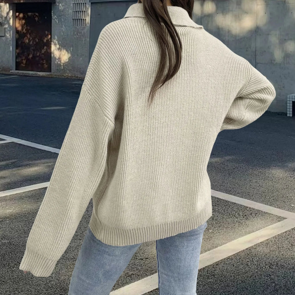 Women's light khaki alpaca fleece pullover sweater with loose lapels and an oblique diagonal zip.