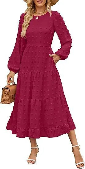 Beige women's high-waisted long sleeve dress with ruffled sleeves on a hanger.
