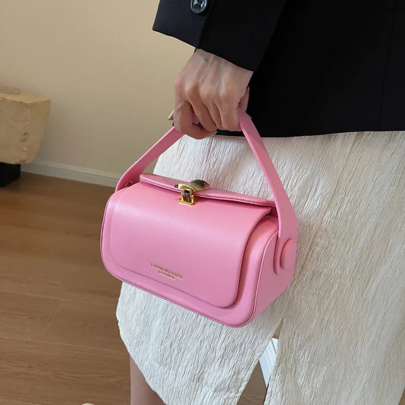 Personalised women's PU leather messenger shoulder bag with letter detailing, shown in beige.