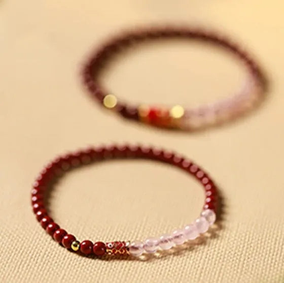 Hand-woven unisex retro Koi bracelet with Purple Gold Sand, Strawberry Quartz, and crystal beads on display