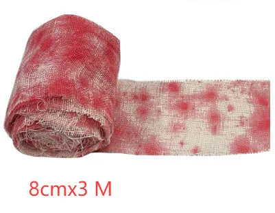 Bloody red polyester Halloween bandage roll showing 8cm width and textured surface for costume use.