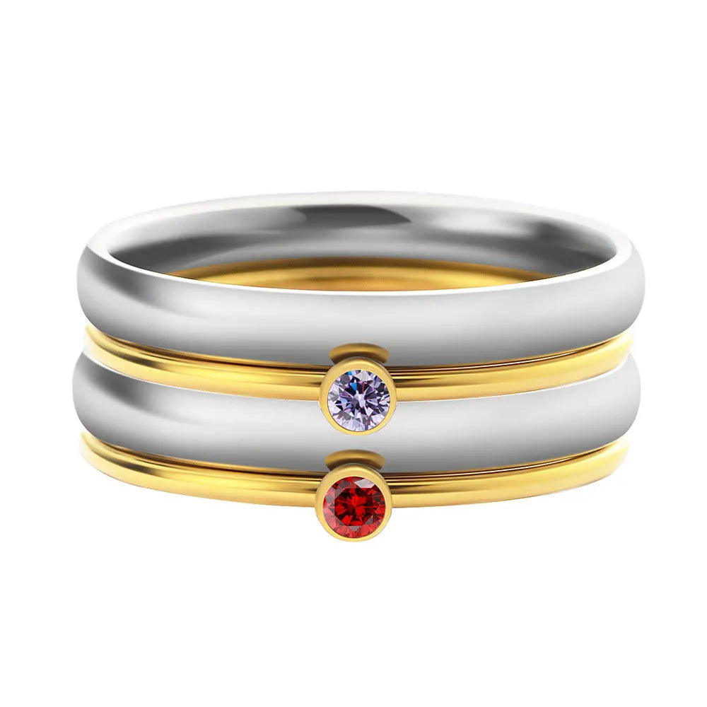 A geometric titanium steel ring engraved with a December birthstone superimposed design.