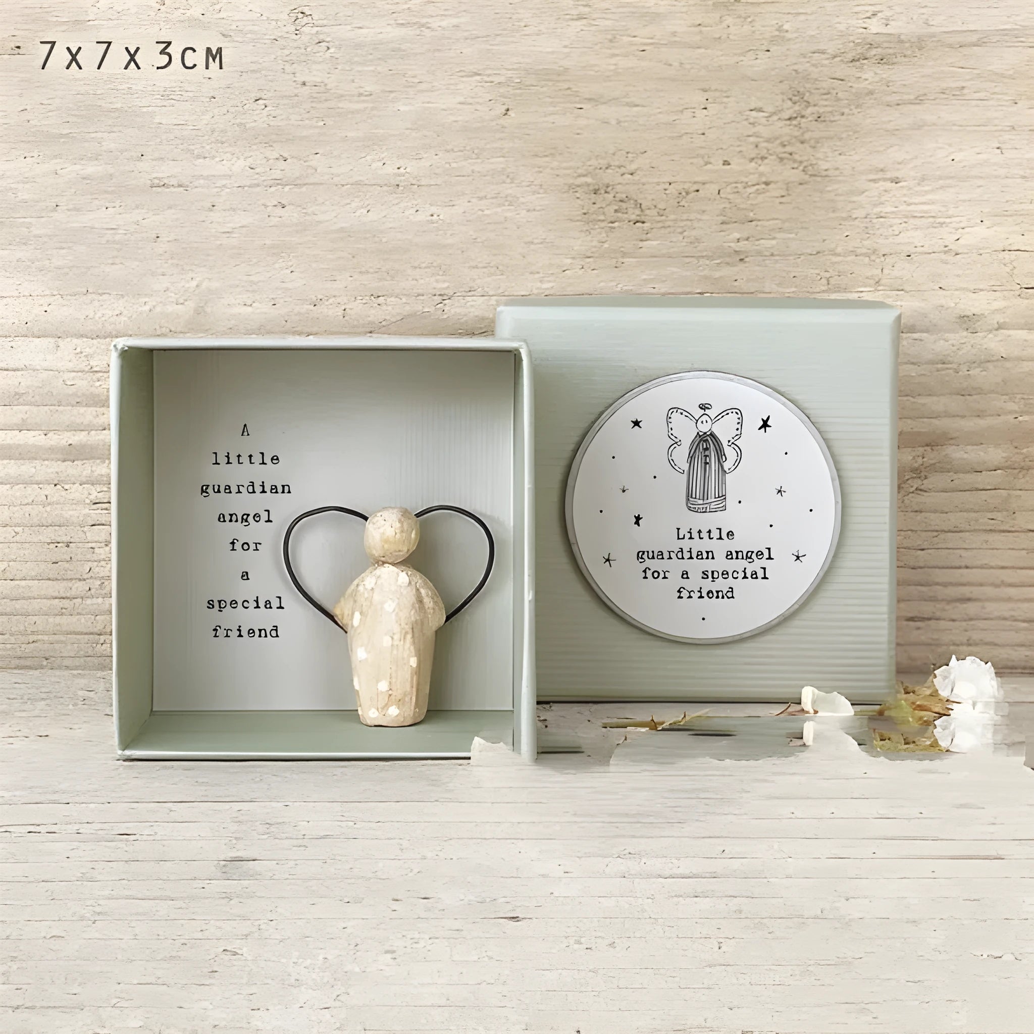 Boxed guardian angel ornament in modern simplicity style with resin plastic construction
