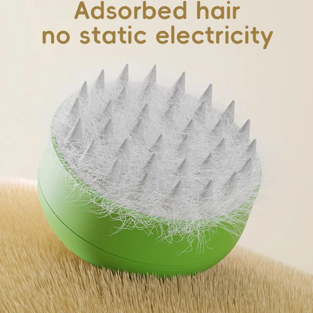 Green and yellow rechargeable silicone steam brush for cat and dog grooming on a white background