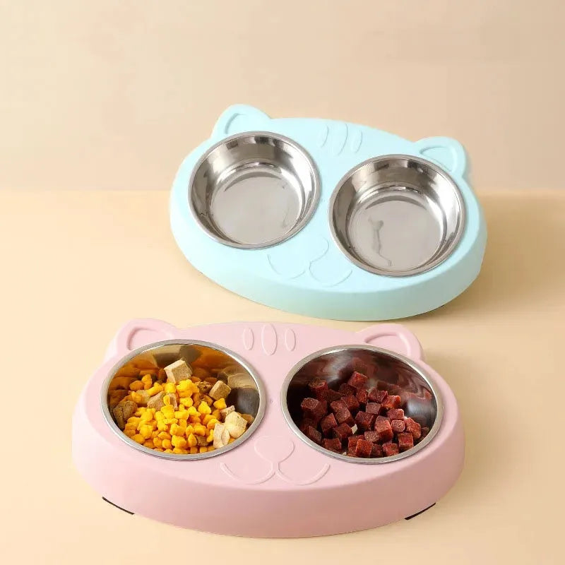 Macaron-shaped plastic pet feeder tray with two bowls in blue, green, or pink colour options