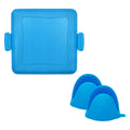 Red silicone anti-scald baking tray with matching gloves on kitchen counter
