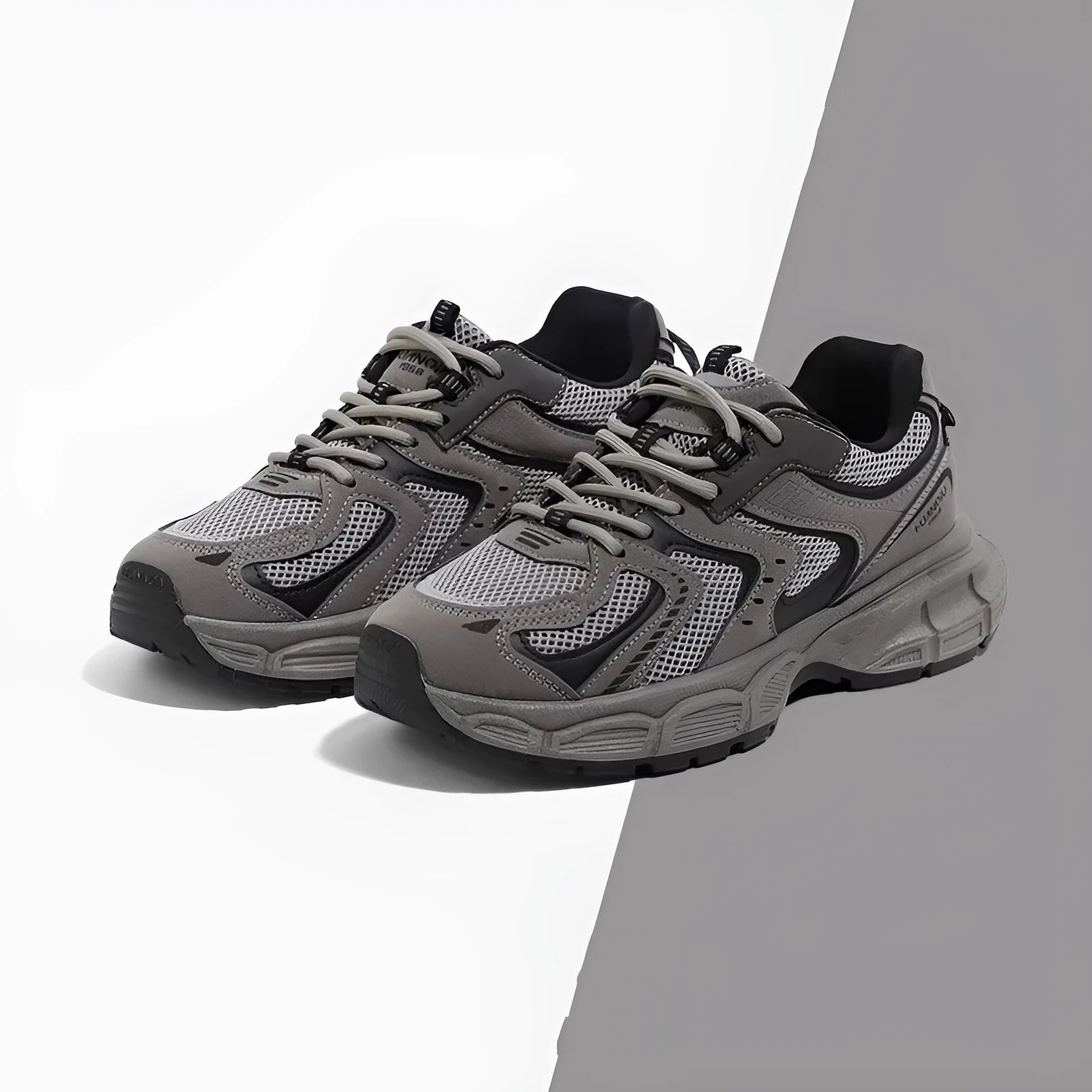 Men's low-top platform casual sneaker dad shoes with EVA sole and leather stitching on PU mesh upper