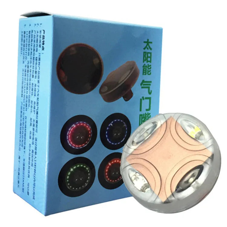 Colourful solar powered wheel hub lamp valve on a car tyre with intelligent induction system