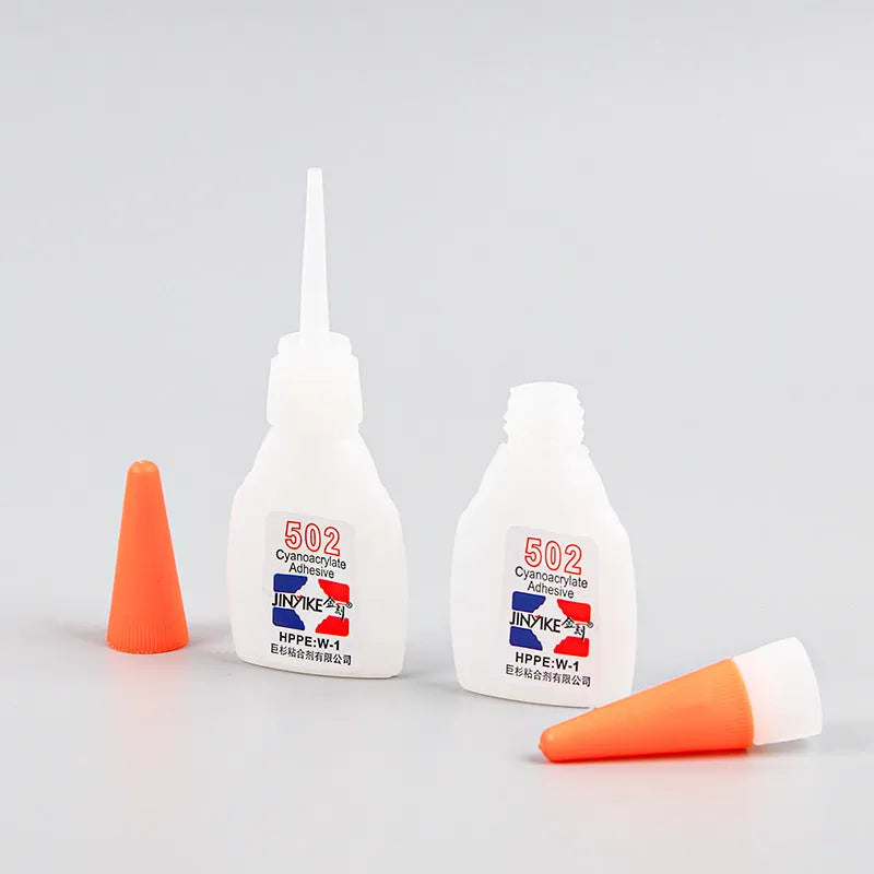 Shoe repair adhesive kit showing a glue tube and a 3x9 cm adhesive patch on a white background.