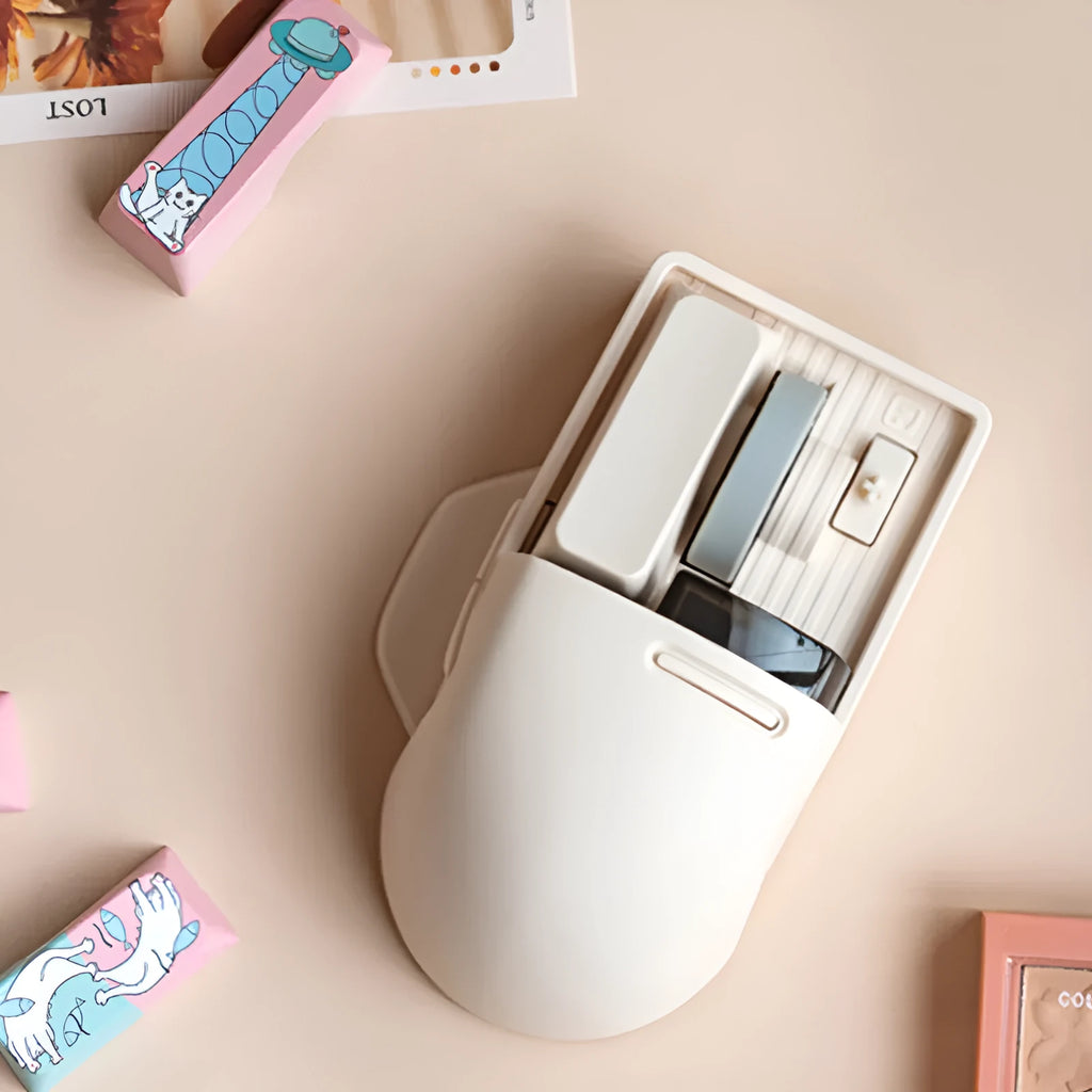 Tofu colour ergonomic wireless mouse shown with USB receiver and USB-C charging cable on a desk.