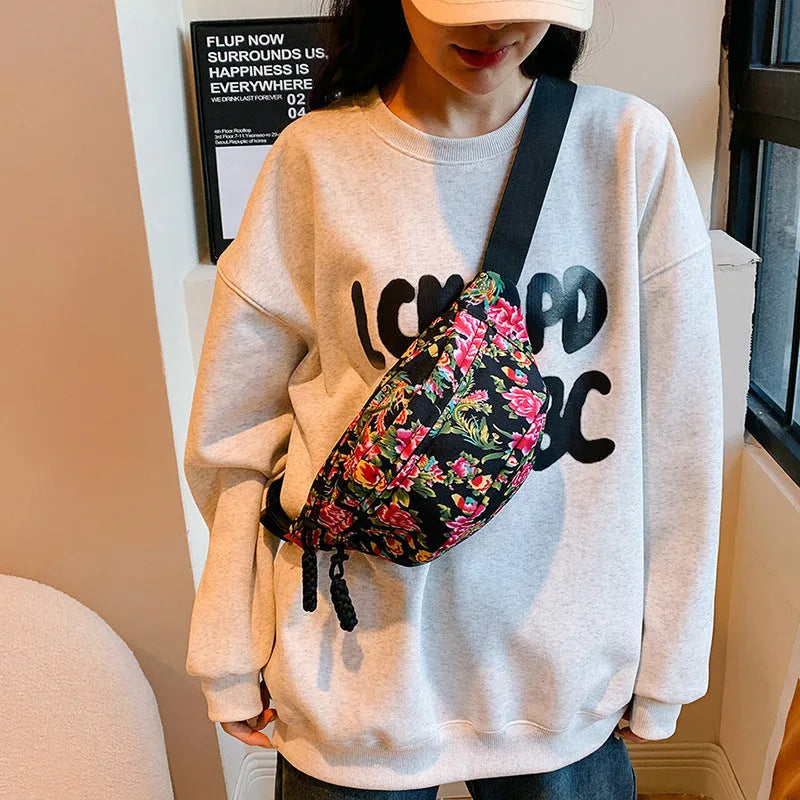 Women's western style waist bag with floral embroidery in black, red, green or blue colours