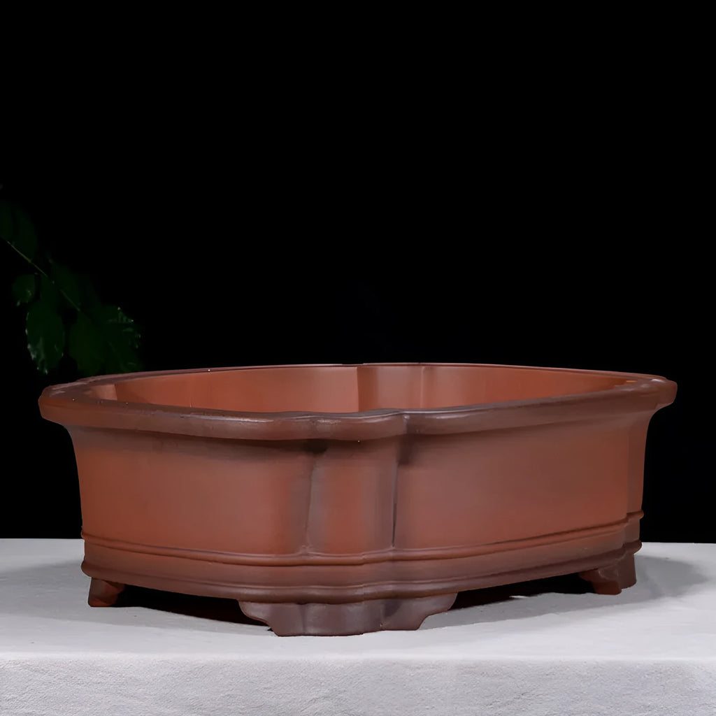 Large antique-finish purple clay Chinese style garden flower pot showing its size and deep planting cavity.