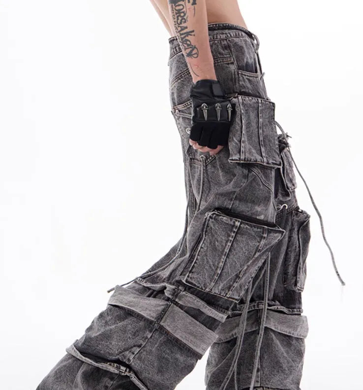 Grey distressed denim overalls with rope stitching and mop pant design