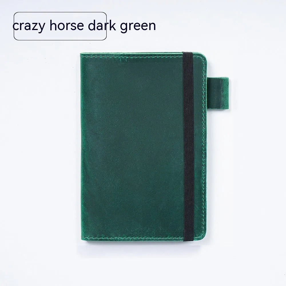 Handmade kraft notebook with cowhide cover in choice of six colours, showing open pages of wood-free paper.