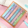 Cat's Paw fluorescent marker pen set with six colours in a plastic case, showing oblique nibs.