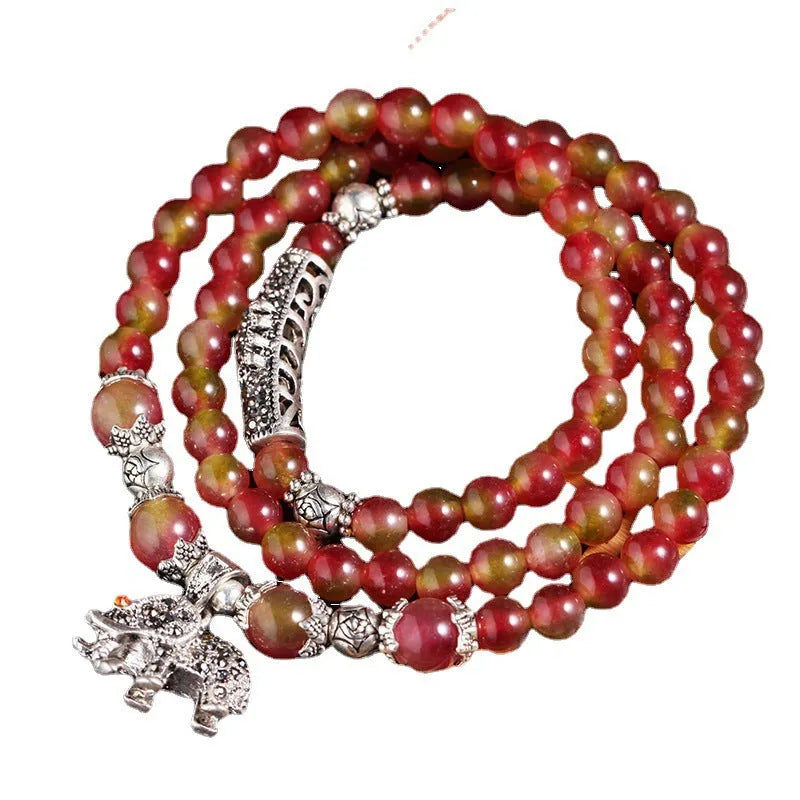 Handmade natural watermelon crystal bracelet with Chinese knotting in elephant style geometric design