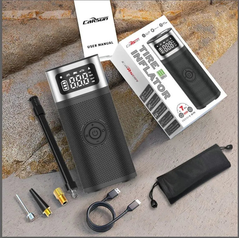 Black portable wireless air pump with USB cable and accessory nozzles for vehicles and sports equipment