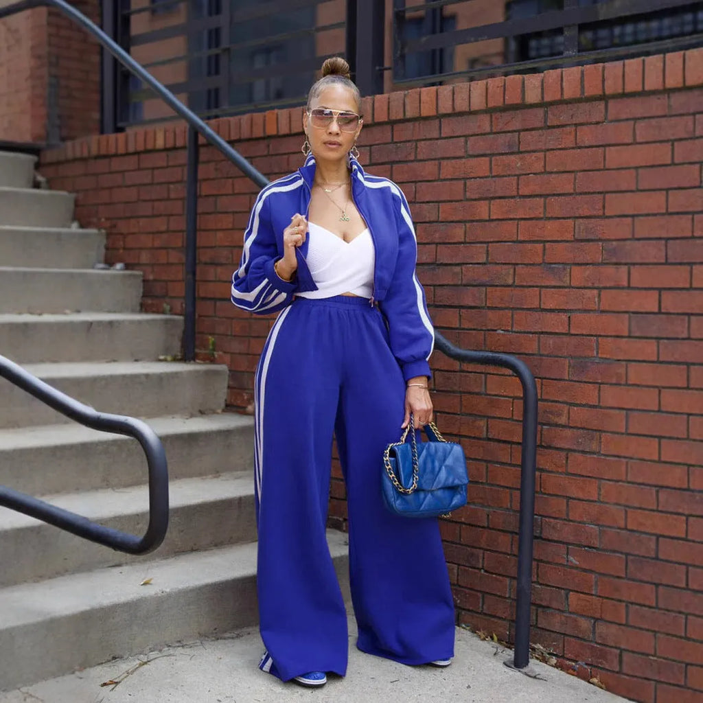 Striped casual two-piece suit set with zipper detail, shown in one of six available colours.
