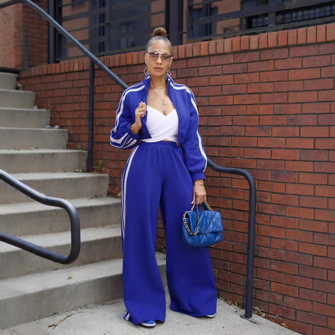 Striped casual two-piece suit set with zipper detail, shown in one of six available colours.