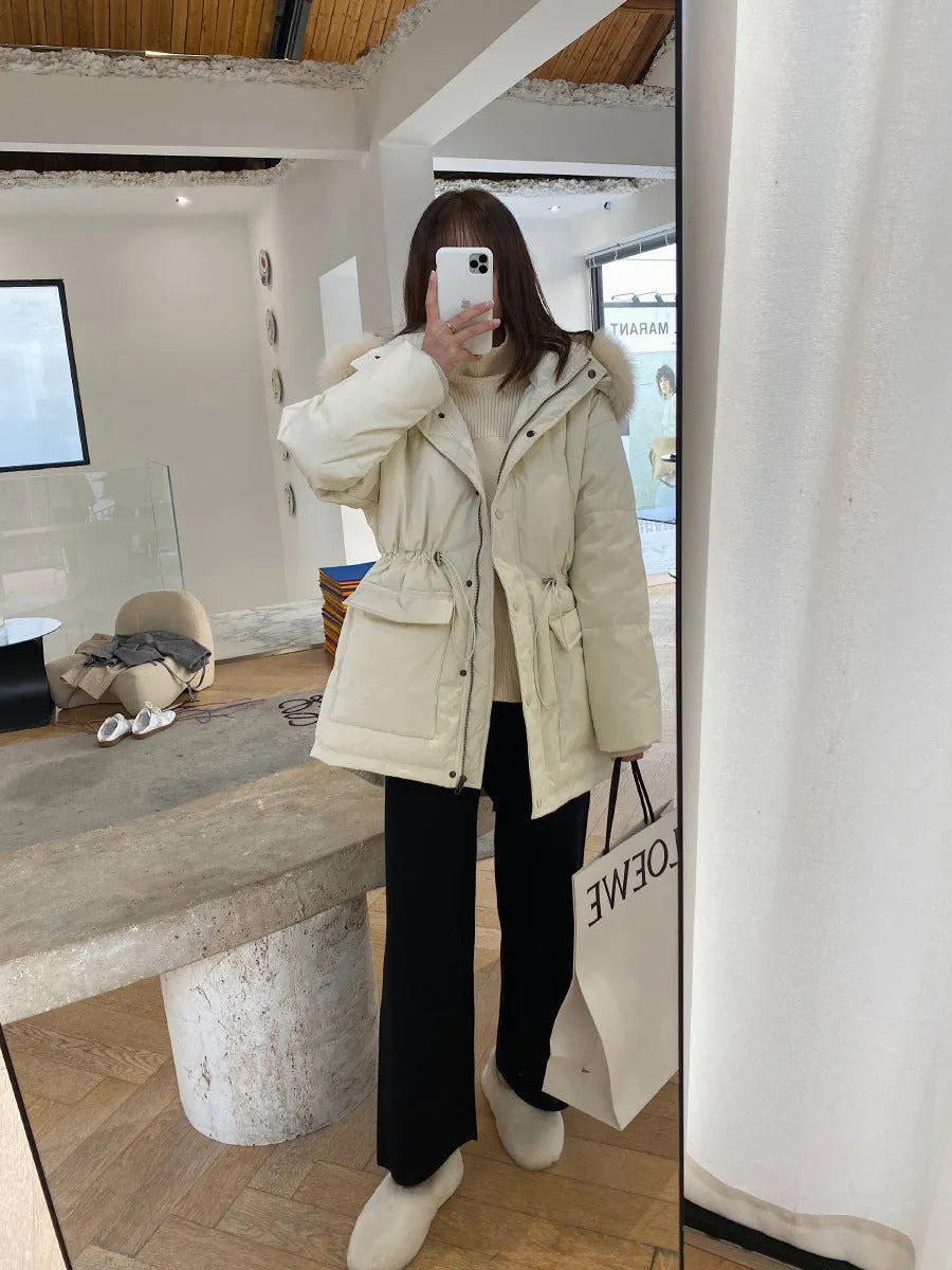 Women's high-waisted wide-leg knitted trousers in cream white, casual autumn winter style.