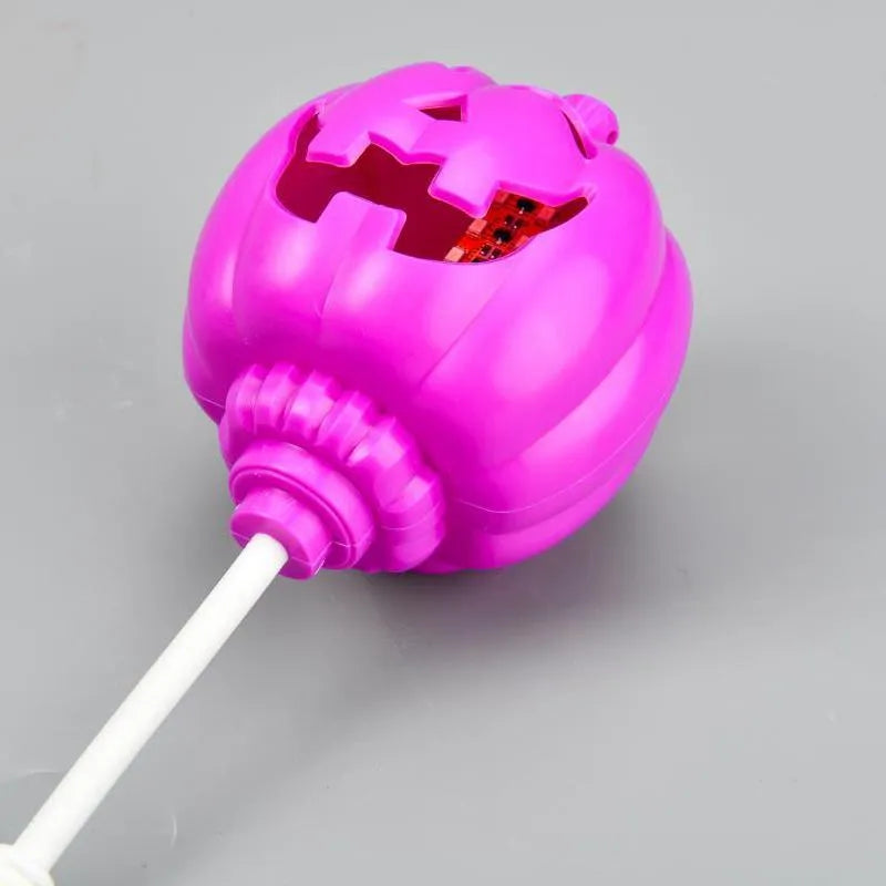 Plastic pumpkin lamp with USB cable, showing yellow and purple light options, scale shown against 8.3x22cm dimensions