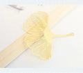 Brass metal bookmark with hollow maple leaf pattern and rose gold tassel