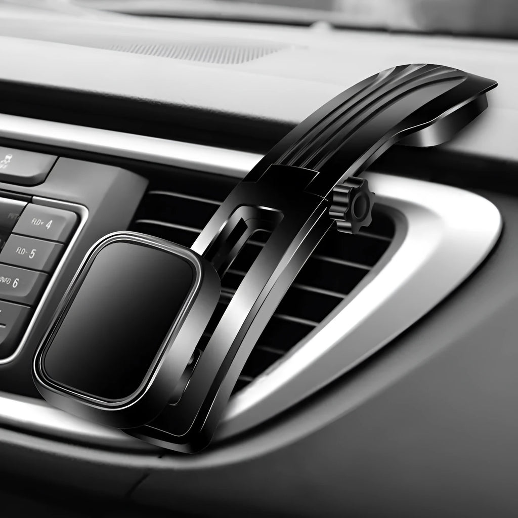 Black car centre console magnetic suction cup phone holder with slide rail and automatic lock mounted on dashboard