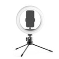 10 inch ring fill light desktop tripod stand with Bluetooth remote and phone holder on a table