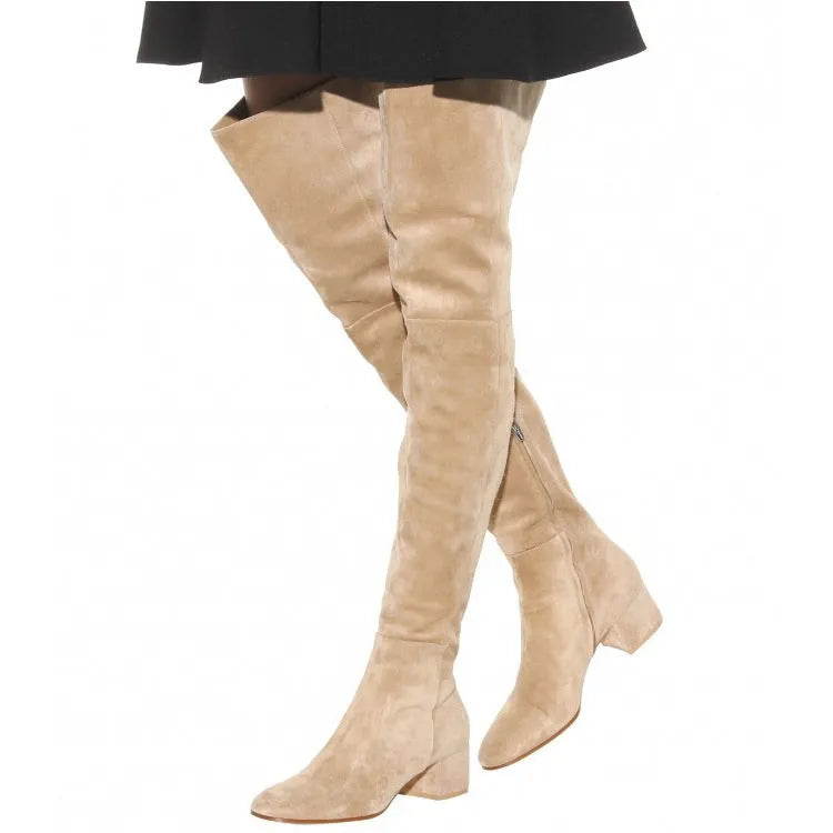 Grey suede women's flat over the knee boots with a pointed toe and thick low rubber sole.
